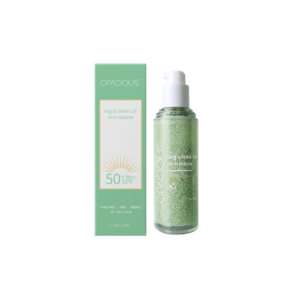 Opacious Aqua Tone Up Sun Serum bottle with mint-green box, SPF 50+ sun protection visuals on label.